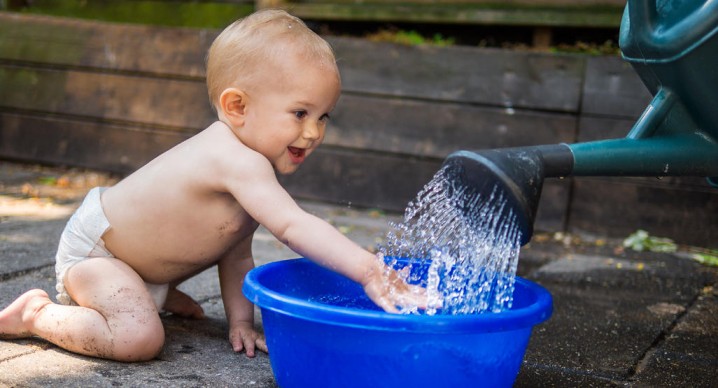  incorporate water play into activities for a 10-month-old baby